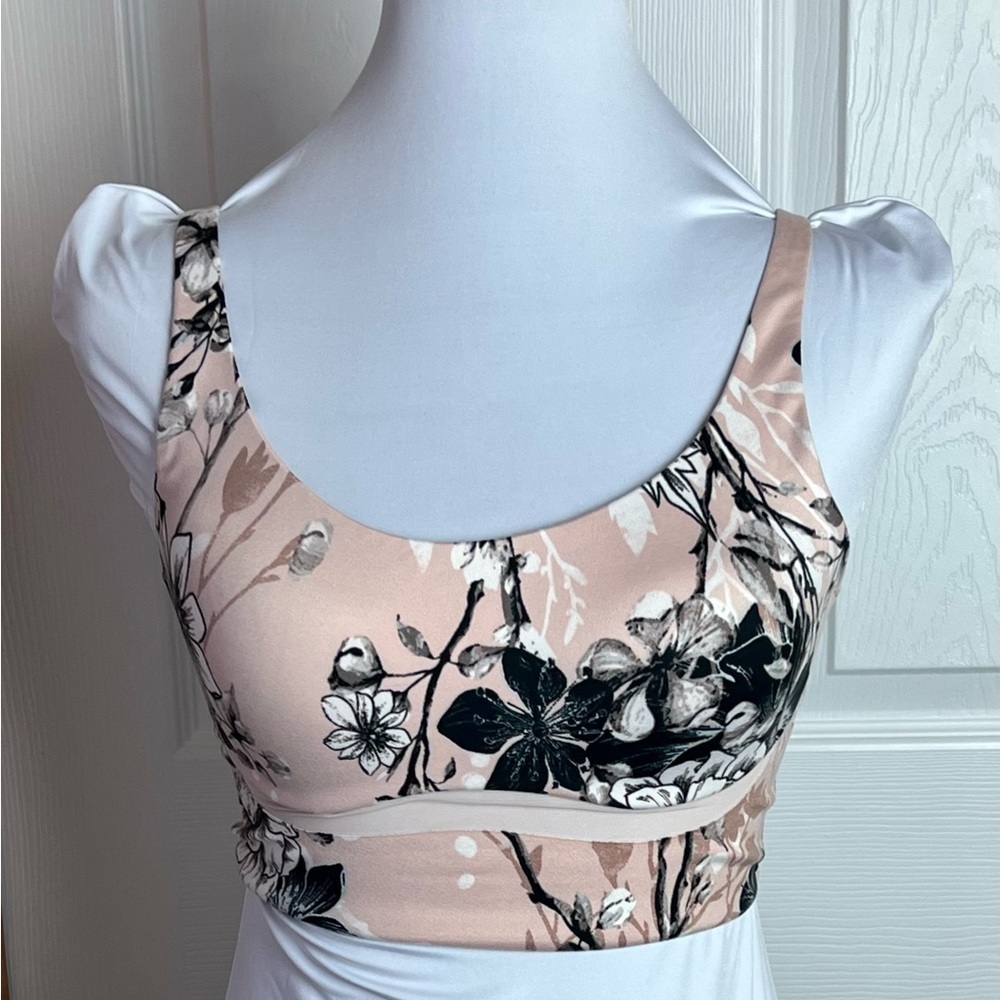 Victoria’s Secret floral sports bra 32D with adjustable straps.